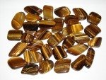 photo of 20 or so tiger eye gemstones