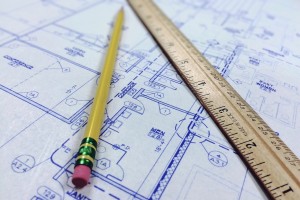 photo of pencil and ruler on blueprints